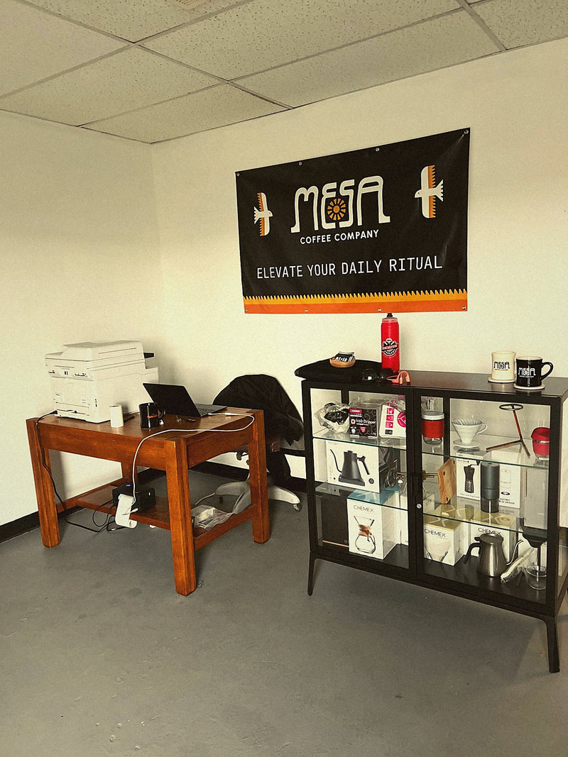Mesa's roastery office with the gear display case
